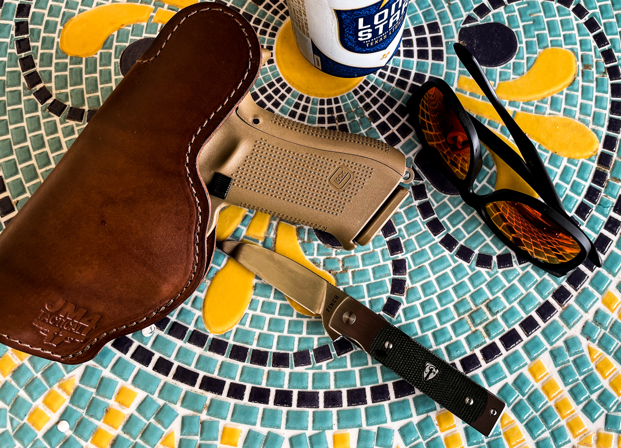 An EDC dream come true - ray bans, Glock 19x, and old school The Holliday